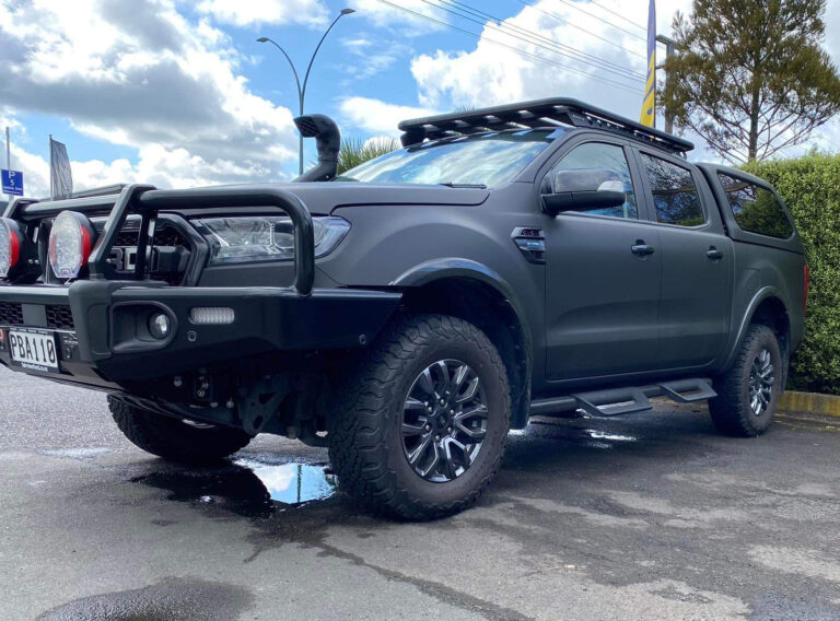 Car with black vehicle wrap